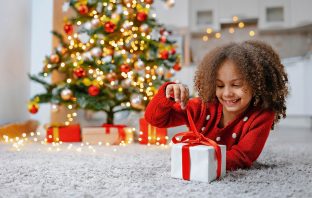 KiDS NEED MoRE HoLiDAY CHEER BUS Celebrates 10th Anniversary with Magic, Joy, and Community Connections